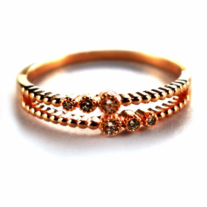 Six stone silver ring with pink gold plating